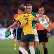 Arsenal teammates Steph Catley and Katie McCabe hug before the match between Australia and the Republic of Ireland