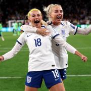 Chloe Kelly and Alex Greenwood celebrate England's win