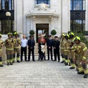 Firefighters outside Islington Town Hall with Julie and Kevin