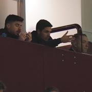 Mikel Arteta looks on from the stands at Villa Park