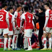 Arsenal boss Mikel Arteta talks to his players during their game with Brighton