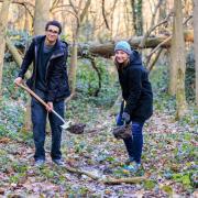 Kate Bradbury and Xavier Mahele digging the first of 100 new ponds for the London Blue Chain walking route