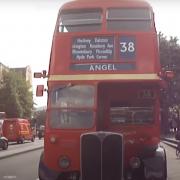 A classic bus in London screengrabbed from a YouTube video from 'Captured in India, London & the UK