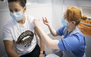 A nurse administers a coronavirus vaccine. Covid-19 cases have risen considerably in Islington