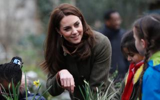 The Duchess of Cambridge speaks with children during a visit to the King Henry's Walk Garden in Islington, London to learn about a project bringing people together through a shared love of horticulture. PRESS ASSOCIATION Photo. Picture date: Tuesday