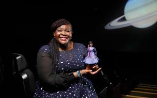 Dr Maggie Aderin-Pocock with her Barbie doll