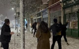 An impromptu snowball fight broke out on the Holloway Road after heavy snowfall